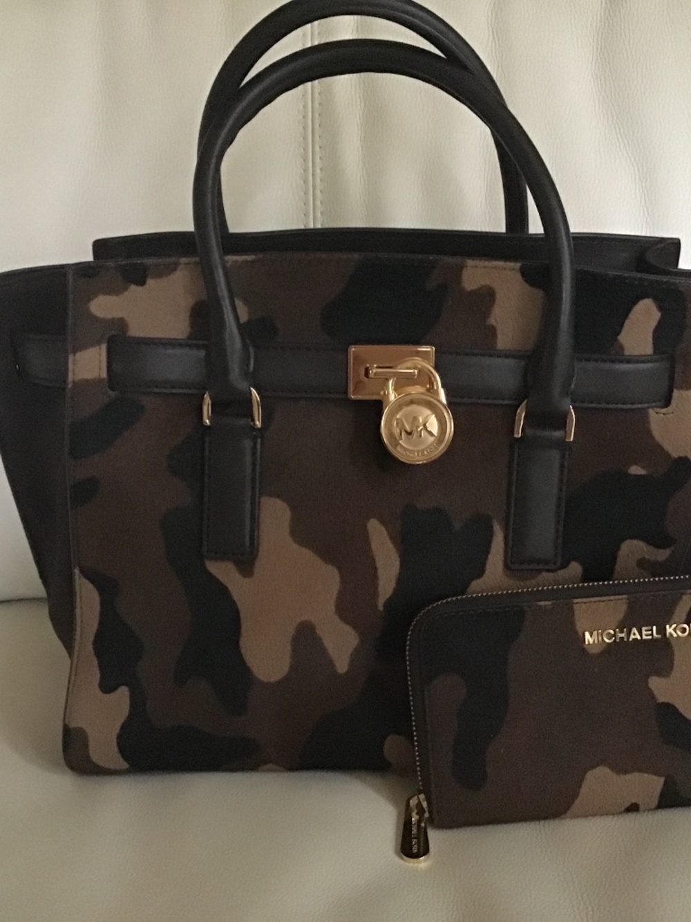 Michael Kors purse with a matching wallet